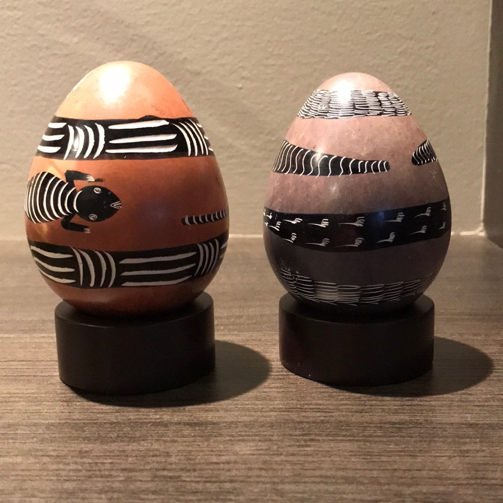 African sculptures two big eggs